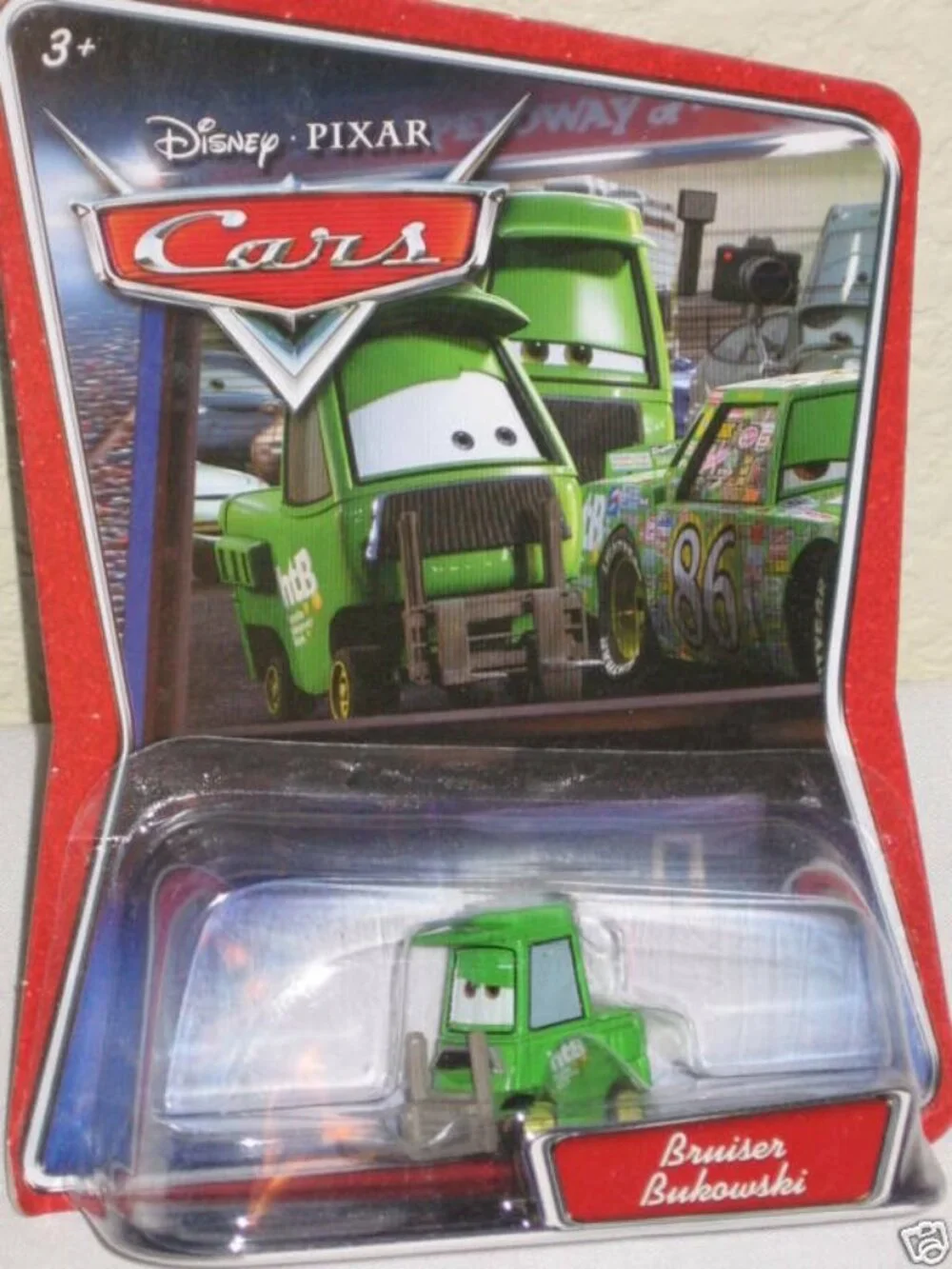 Disney Pixar Cars Bruiser Bukowski Die-Cast Green Toy Figure New In Packaging